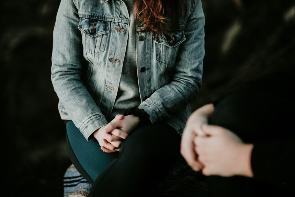 Self-Care for Mental Health: 10 Powerful Ways to Prioritize Your Well-Being 4 a close up shot of woman taking therapy